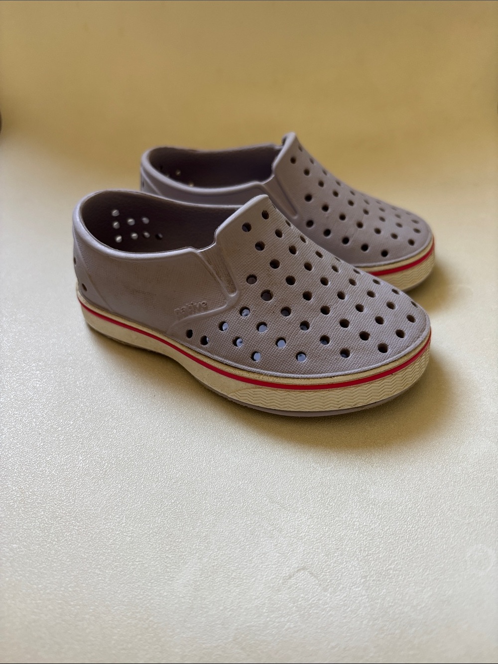 Native Shoes Kids Slip-On Water Shoes in Light Gray with Red Stripe